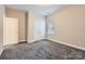 Bedroom features carpet and closet at 5604 Bradford Lake Ln, Charlotte, NC 28269