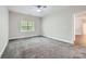 Bedroom featuring carpet and a ceiling fan at 5604 Bradford Lake Ln, Charlotte, NC 28269