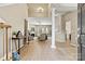 Spacious foyer leads to the living room with fireplace and lots of natural light at 5722 Kirkwynd Commons Dr, Charlotte, NC 28278