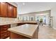 Kitchen showcases dark wood cabinetry, stainless appliances, and spacious breakfast nook at 5722 Kirkwynd Commons Dr, Charlotte, NC 28278