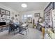 A carpeted bonus room with many quilting projects, tables, and sewing machines at 5803 Lindley Crescent Dr, Indian Trail, NC 28079