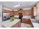 Bright kitchen with ample cabinet space, a center island, and modern appliances at 5803 Lindley Crescent Dr, Indian Trail, NC 28079