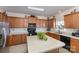 Kitchen featuring ample cabinet space, a center island, and modern appliances at 5803 Lindley Crescent Dr, Indian Trail, NC 28079