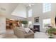 Open-concept living room featuring a fireplace and view into the adjacent kitchen at 5803 Lindley Crescent Dr, Indian Trail, NC 28079