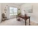 Bright office with a wooden desk, large window, and neutral decor at 5803 Lindley Crescent Dr, Indian Trail, NC 28079