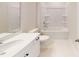 Bathroom features white cabinets, white countertop, white tile floor and shower-tub combo at 606 Banter Ln # 30, Cramerton, NC 28032