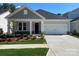 Charming single-Gathering home with a two-car garage, manicured lawn, and craftsman-style details at 606 Banter Ln # 30, Cramerton, NC 28032