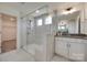 The spacious primary bath has a glass shower, tile, and a white vanity at 6113 Russo Ct, Lancaster, SC 29720