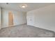 Spacious bedroom featuring a double door closet and neutral walls and carpet provides a serene retreat at 6113 Russo Ct, Lancaster, SC 29720