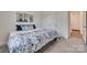 Bright bedroom with a bed dressed in blue floral bedding at 6113 Russo Ct, Lancaster, SC 29720