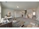 Spacious living room with modern decor, neutral paint, and open staircase is great for entertaining or everyday living at 6113 Russo Ct, Lancaster, SC 29720