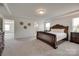 The primary bedroom features wood furnishings, carpet flooring, and a connecting bathroom at 6113 Russo Ct, Lancaster, SC 29720