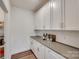 Walk-in pantry with white cabinets and shelving, offering ample storage space for groceries at 6113 Russo Ct, Lancaster, SC 29720