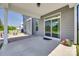 Covered patio with concrete flooring and sliding glass doors leading to backyard at 6113 Russo Ct, Lancaster, SC 29720
