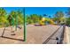 Community playground with swings, slides, and various recreational equipment at 6113 Russo Ct, Lancaster, SC 29720