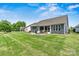 Lush backyard and patio area provide ample outdoor space for recreation and entertaining at 7549 Short Putt Ct, Charlotte, NC 28215