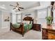 Well-lit main bedroom with carpet and luxury furnishings and windows providing natural light at 7549 Short Putt Ct, Charlotte, NC 28215
