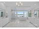 Large bathroom with dual sinks, a standalone tub, walk-in shower and waterfront views at 7861 Live Oaks Dr, Denver, NC 28037