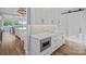 Gourmet kitchen with custom cabinetry, stainless steel appliances, and marble countertops at 7861 Live Oaks Dr, Denver, NC 28037