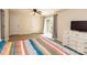 Bright bedroom boasts wood-look floors, white trim, and a sliding glass door at 85 Riley Dr, Taylorsville, NC 28681
