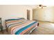 Bright bedroom features wood-look floors, neutral walls, and a ceiling fan at 85 Riley Dr, Taylorsville, NC 28681