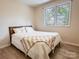 Cozy bedroom features a comfortable bed and a large window with natural light at 85 Riley Dr, Taylorsville, NC 28681