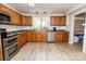 Well-equipped kitchen with stainless steel appliances and ample cabinet space at 85 Riley Dr, Taylorsville, NC 28681