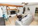 Cozy living room features a stone fireplace, wood beam accents, and neutral decor at 85 Riley Dr, Taylorsville, NC 28681