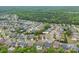 Aerial view showing the location of 866 Tyne Dr with beautiful backyard pools within a well-maintained neighborhood at 866 Tyne Dr, Fort Mill, SC 29715