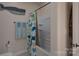 Bright bathroom with a bathtub and shower combination featuring a colorful shower curtain at 866 Tyne Dr, Fort Mill, SC 29715