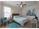 Cozy bedroom with a ceiling fan, carpeted floor, and a calming color scheme at 866 Tyne Dr, Fort Mill, SC 29715