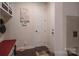 Functional entryway with a bench, storage and a 'Gathering rules' themed wall decoration at 866 Tyne Dr, Fort Mill, SC 29715