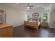 Expansive main bedroom boasts recessed lighting and tray ceilings, and includes an alcove with bench seating at 866 Tyne Dr, Fort Mill, SC 29715