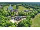 Aerial shot of community amenities including a pool, clubhouse, golf course and surrounding neighborhood at 8716 Ruby Hill Ct, Waxhaw, NC 28173