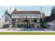 Beautiful backyard featuring a large in-ground swimming pool and outdoor lounge area at 8716 Ruby Hill Ct, Waxhaw, NC 28173