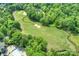 Lush golf course with mature trees and water features, accompanied by community pool and cabana area at 8716 Ruby Hill Ct, Waxhaw, NC 28173