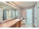 Bathroom with a walk-in shower and a large vanity at 8919 Oransay Way, Charlotte, NC 28278