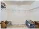 Walk-in closet with wire shelving and neutral-colored walls at 8919 Oransay Way, Charlotte, NC 28278