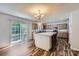 Open kitchen featuring an island, stainless steel appliances, and sliding glass door to backyard at 8919 Oransay Way, Charlotte, NC 28278
