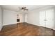 Large main bedroom features hardwood floors, large closet, and an en-suite bathroom at 8936 Rittenhouse Cir, Charlotte, NC 28270