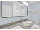Bathroom with double vanity featuring modern faucets, towel and decorative accent at 9809 Hanover Hollow Dr, Charlotte, NC 28210