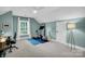 Inviting bedroom with workspace featuring natural light for work and exercise at 9809 Hanover Hollow Dr, Charlotte, NC 28210