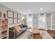 Cozy living room with ample seating, natural light, and stylish decor at 9809 Hanover Hollow Dr, Charlotte, NC 28210