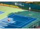 View of well-maintained tennis courts at the Park Crossing Swim & Racquet Club at 9809 Hanover Hollow Dr, Charlotte, NC 28210