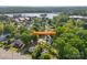 Overhead shot of home, surrounded by trees, in a neighborhood near a lake at 1 Linestowe Dr, Belmont, NC 28012