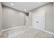 Spacious bedroom featuring neutral walls, plush carpeting, a closet and bright lighting for a cozy ambiance at 1 Linestowe Dr, Belmont, NC 28012