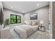 Bedroom with a large window, neutral walls, and a blue patterned rug for a calming aesthetic at 1 Linestowe Dr, Belmont, NC 28012