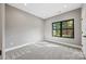 Bedroom with a neutral color palette, large window, and ample space for furnishings at 1 Linestowe Dr, Belmont, NC 28012