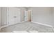 Bedroom featuring neutral walls, gray carpet, and a closet with double doors at 1 Linestowe Dr, Belmont, NC 28012