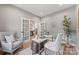 Stylish office area with decorative wall art and direct access to the living room at 1 Linestowe Dr, Belmont, NC 28012